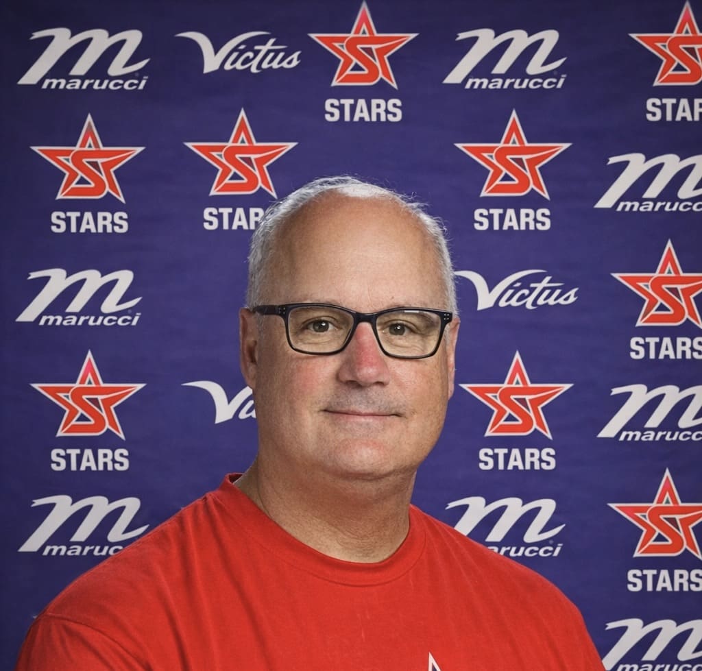 Professional headshot with Stars logo backdrop