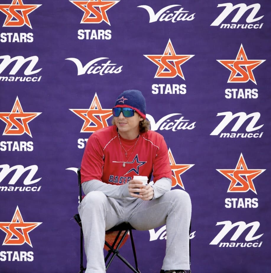 Baseball coach in relaxed pose